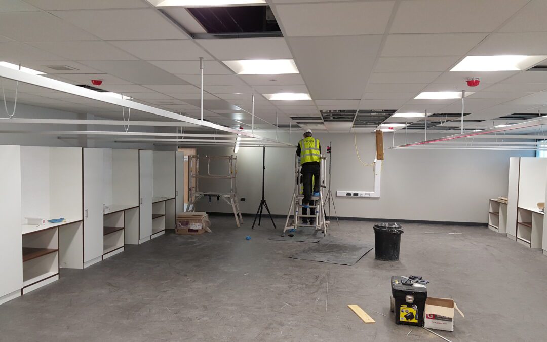 Installation of curtain track systems for beauty school